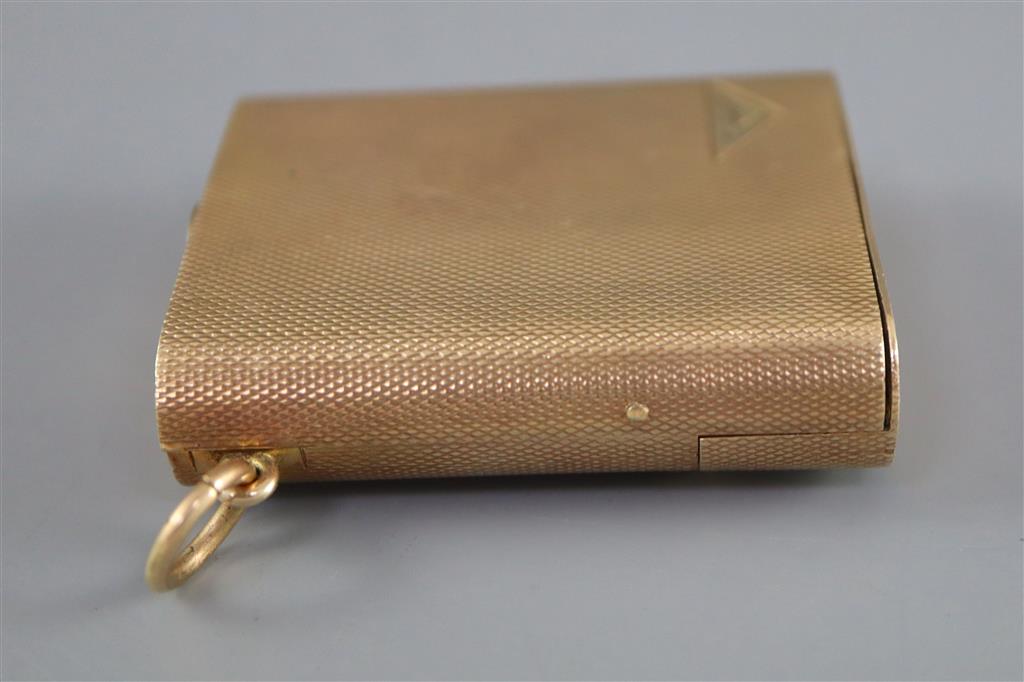 A 1920s engined turned 9ct gold mounted Dunhill lighter, by Finnigans Ltd, London, 1928,